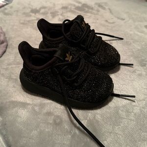 Infants Adidas size 4 laced sneakers.